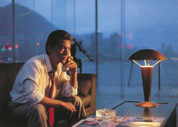 Henry Wong speaking on the telephone in his Hong Kong office